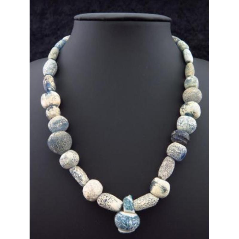 Egyptian necklace made of blue/green glass beads