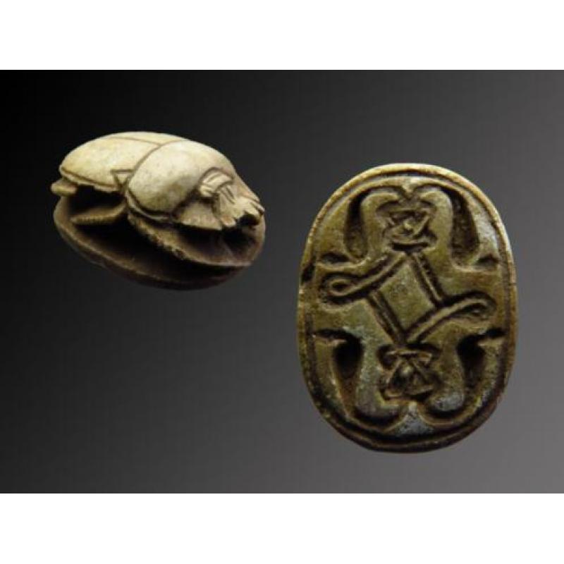 Egyptian steatite scarab with decorations of four Uraeus cob